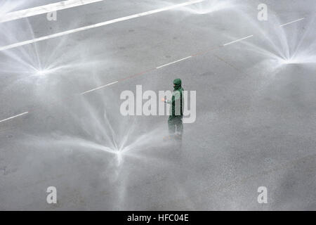 U.S. Navy Aviation Boatswain's Mate (Handling) Airman Matthew A. Anaya conducts a sprinkler test during a salt water wash on the flight deck of the aircraft carrier USS George H.W. Bush (CVN 77) in the Atlantic Ocean Jan. 8, 2013. The George H.W. Bush was conducting training and carrier qualifications. (U.S. Navy photo by Mass Communication Specialist 2nd Class Leonard Adams Jr./Released) George HW Bush undergoes a planned incremental availability 130108-N-VA840-164 Stock Photo