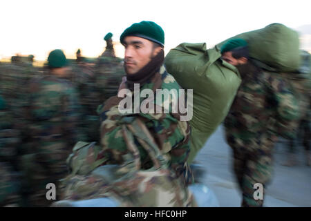 091119-N-6939M-013  KABUL (Nov. 19, 2009) Graduates from Afghan National Army accelerated combat company training program arrive at Kabul international airport to be transported to Camp Bastion in the Helmand province where they will reinforce troops of the ANA 205th battalion. Accelerated companies are part of the goal of a 134,000 soldier army by October of 2010. The companies play an integral role in the increased capability of the Afghanistan National Army. 091119-N-6939M-013 KABUL, Afghanistan (US Navy photo by Mass Communication Specialist 1st Class Christopher Mobley) (RELEASED) Graduat Stock Photo