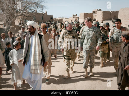 GHAZNI PROVINCE, Afghanistan (March 17, 2010) — U.S. Army Gen. Stanley A. McChrystal and Polish Army Col. Wasielewski walk through the village of Pana in Giro District. (U.S. Navy photo by Petty Officer 1st Class Mark O’Donald/Released) Joint Patrol in Ghazni Province 274016 Stock Photo