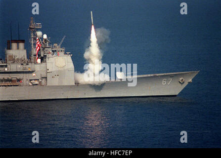 960903-N-SHILOH-002  Northern Arabian Gulf. . . .A first strike tomahawk missile is released from the forward vertical launch system (VLS) aboard the U.S. NavyÕs Ticonderoga Class cruiser USS Shiloh (CG 67), on the morning of September 3, 1996.   Following Saddam HusseinÕs offensive action into Kurdish territory within the UN sponsored Òno-fly zoneÓ, U.S. Naval forces launched 14 Tomahawk Cruise missiles on targets in southern Iraq.  President Clinton authorized repeated action less than 24 hours later, after DOD officials determined that additional missiles were needed to ensure that targets  Stock Photo