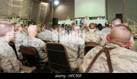 A host of U.S. and other NATO Training Mission-Afghanistan coalition servicemembers listen intently as former 'Good Morning America' host David Hartman and Apollo astronauts Neil Armstrong, Jim Lovell and Gene Cernan discuss their feats in space during the 'Legends of Aerospace' United Services Organization tour at NATO Training Mission-Afghanistan headquarters on Camp Eggers in Kabul, Afghanistan, August 16, 2011. The astronauts, all former U.S. Navy officers, gladly recanted tales of the pioneer voyages into space and walking on the moon. (U.S. Navy photo by Mass Communication Specialist 2nd Stock Photo