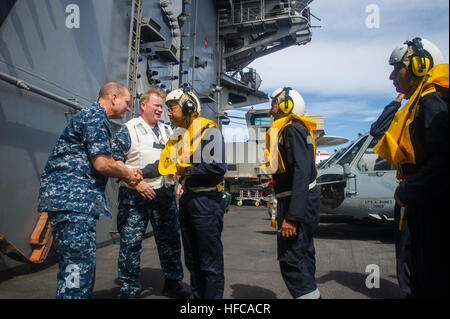 Rear Adm. Mark Montgomery, commander, Battle Force 7th Fleet, speaks ...