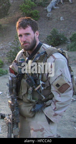 050628-N-0000X-002 Navy file photo of SEAL Lt. Michael P. Murphy, from Patchogue, N.Y. Murphy was killed by enemy forces during a reconnaissance mission, Operation Red Wing, June 28, 2005, while leading a four-man team tasked with finding a key Taliban leader in the mountainous terrain near Asadabad, Afghanistan. The team came under fire from a much larger enemy force with superior tactical position. Murphy knowingly left his position of cover to get a clear signal in order to communicate with his headquarters and was mortally wounded while exposing himself to enemy fire. While being shot and  Stock Photo