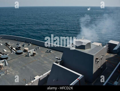 An MK46 30 mm naval weapon system fires aboard amphibious transport dock ship USS New York (LPD 21) during training exercises Sept. 18, 2012, in the Gulf of Aden. New York, part of the Iwo Jima Amphibious Ready Group, along with U.S. Marines with the embarked 24th Marine Expeditionary Unit, deployed in support of maritime security operations and theater security cooperation efforts in the U.S. 5th Fleet area of responsibility. (U.S. Navy photo by Mass Communication Specialist 2nd Class Ian Carver/Released) MK46 30 mm naval weapon system 120918-N-XK513-079 Stock Photo