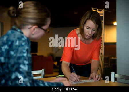 At Naval Air Facility Atsugi, Japan, personnel sign up for the Computer Desktop Notification System to receive alerts via email for emergencies, natural disasters, and base-wide notifications. Stock Photo