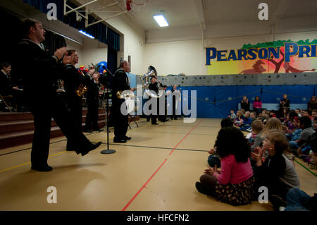 130226-N-QY316-020.POULSBO, Wash. (Feb. 26, 2013) Sailors assigned to Navy Band Northwest???s Brass Band perform ???When the Saints Go Marching In??? at Hilder Pearson Elementary School gymnasium in Poulsbo, Wash. More than 250 students grade kindergarten through fifth were in attendance for the concert. (U.S. Navy Photo by Mass Communication Specialist Seaman Apprentice William Blees/Released) Navy Band Northwest's brass band performs for students 130226-N-QY316-020 Stock Photo