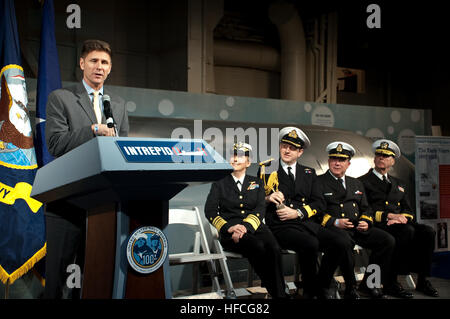 Juan M. Garcia III, assistant secretary of the Navy (Manpower and Reserve Affairs), speaks on the past, present and future of the U.S. Navy Reserves at a ceremony onboard the Intrepid Sea, Air and Space Museum, March 3. Also pictured, Vice Adm. Robin R. Braun, chief of Navy Reserve, Commander, Navy Reserve Forces (second from left), Commodore Andrew Jameson, commander British Maritime Reserves (center), Commodore David W. Craig, commander Canadian Forces Naval Reserve (second from right), and Rear Adm. Joseph D. Stinson, deputy chief of chaplains for Reserve Matters and director of Religious P Stock Photo