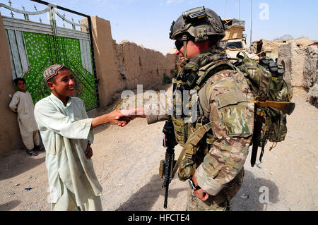 Soldiers patrol and talk with villagers during a mock SWEAT MSO Stock ...