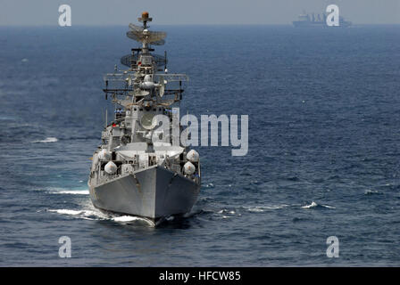 INS Rana (D 52), a Rajput-class destroyer, leads a passing exercise ...