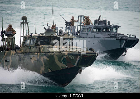 ARABIAN GULF (Nov. 3, 2015) Commander, Task Group (CTG) 56.7’s Riverine Command Boats (RCB) 802 and 805 participate in a bi-lateral exercise with Kuwait naval forces in the Arabian Gulf. The combined-joint exercise provided U.S. forces, which also included U.S. Coast Guard and U.S. Army, an opportunity to exchange tactics and best practices with Kuwait naval forces. CTG 56.7 conducts maritime security operations to ensure freedom of movement for strategic shipping and naval vessels operating in the inshore and coastal areas of the U.S. 5th Fleet area of operations. (U.S. Navy photo by Mass Com Stock Photo