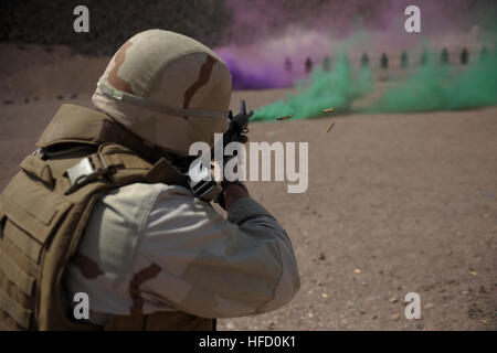 Petty Officer 3rd Class Bryan Silveri, Naval Mobile Construction Battalion 74 armorer, fires a M4 carbine at a familiarization range near Djibouti City, Djibouti, June 4.  Silveri is currently on a six month deployment to Combined Joint Task Force-Horn of Africa. Sailors hone weapon skills in African desert 93442