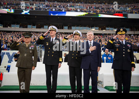 PHILADELPHIA (Dec. 8, 2012) From right to left, Chairman of the Joint Chiefs of Staff Gen. Martin Dempsey, Secretary of the Navy (SECNAV) the Honorable Ray Mabus, Chief of Naval Operations (CNO) Adm. Jonathan Greenert, Vice Adm. Michael Miller, U.S. Naval Academy Superintendent and Lt. Gen. George J. Flynn, Director, J-7, Joint Staff, render honors during the national anthem at the 113th Army-Navy NCAA college football game. The Midshipmen earned a close win over the U.S. Military Academy Cadets with a touchdown in the 4th quarter to edge Army 17-13. (U.S. Navy photo by Mass Communication Spec Stock Photo
