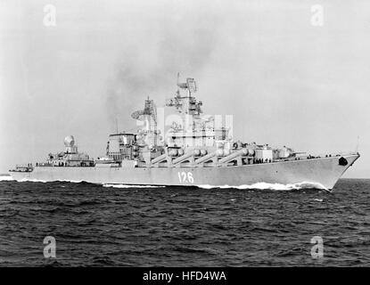 An aerial starboard bow view of a Soviet Slava class guided missile cruiser underway. Slava1983 Stock Photo