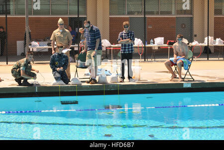 Capt. D.J. LeGoff, Tactical Network Program Manager, (PMW 160) observes a Navy Sea Cadet SeaPerch Remotely Operated Vehicle (ROV) as the team navigates the deepwater mission portion of the San Diego Regional SeaPerch Competition at Grossmont College. SeaPerch, sponsored by the Office of Naval Research (ONR), is an innovative underwater robotics program that trains teachers to teach their late elementary through high school students how to build ROVs from low-cost kits. LeGoff and several Space and Naval Warfare Systems Command (SPAWAR) personnel volunteered as judges, timekeepers and in-water  Stock Photo