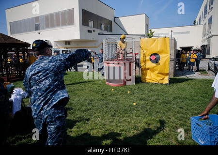 NEWPORT NEWS, Va. (May 26, 2016) --  Sailors assigned to Pre-Commissioning Unit Gerald R. Ford (CVN 78) participate in a dunk tank game during the summer safety expo. The expo coincides with the Navy Safety Center’s 101 Critical Days of Summer campaign, it raises awareness of possible off-duty mishaps during the summer months.  (U.S. Navy photo by Mass Communication Specialist Seaman Apprentice Connor Loessin/Released) Summer Safety Expo 160526-N-YW238-105 Stock Photo