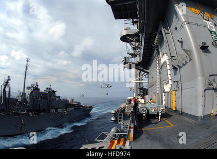 The Military Sealift Command fast-combat support ship USNS Arctic (T-AOE 8) sails alongside the Nimitz-class nuclear-powered aircraft carrier USS Harry S. Truman (CVN 75) during a vertical replenishment-at-sea. Truman is assigned to 6th Fleet and is conducting theater security cooperative activities in the eastern Mediterranean. Theater security cooperative activities 66797 Stock Photo