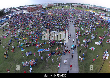 150704-N-OY319-002 PENSACOLA, FL (July 4, 2015) More than 18,000 fans attended a Tour for the Troops concert and fireworks show July 4 onboard Naval Air Station (NAS) Pensacola, featuring country artist headliner Darius Rucker. The concert, which also featured special guests Michael Ray and Jacob Davis, was sponsored by the Air Force Reserve, NAS Pensacola Morale, Welfare, and Recreation (MWR), Pen Air Federal Credit Union and Kia Autosports. A native of Charleston, S.C, Rucker was the lead singer of Hootie and the Blowfish before successfully launching his solo career.  According to the singe Stock Photo