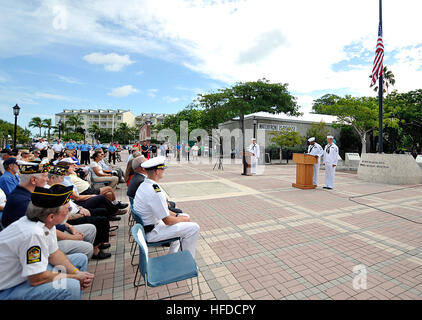 U.S. Navy chief petty officer selectees recall the 9/11 events that occurred 13 years ago during a 9/11 remembrance ceremony at the Key West-Florida Keys Historic Military Memorial in Key West, Fla., Sept. 11, 2014. Terrorists hijacked four passenger aircraft Sept. 11, 2001. Two of the aircraft were deliberately crashed into the World Trade Center in New York; one was crashed into the Pentagon; the fourth crashed near Shanksville, Pa. Nearly 3,000 people died in the attacks. (U.S. Navy photo by Mass Communication Specialist 1st Class Brian Morales/Released) U.S. Navy chief petty officer select Stock Photo