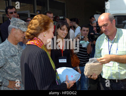 U.S. Army Gen. Bantz J. Craddock, Commander United States European Command and Henrietta H. Fore, Administrator US Agency for International Development and Director of United States Foreign Assistance, inspect humanitarian assistance packages at an internally displaced person's site in the Republic of Georgia to observe the United States' humanitarian assistance efforts in the Republic of Georgia. At the request of the government of Georgia, humanitarian assistance efforts are being coordinated by the U.S. Department of State and USAID with assistance, as required being provided by the Departm Stock Photo