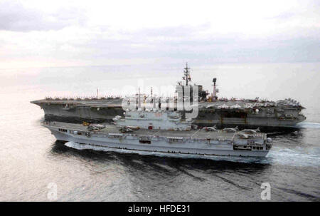 960119-N-7729M-004  (January 19, 1995). . . .Adriatic Sea. . . . The Italian light aircraft carrier Giuseppe Garibaldi (front) and the U.S. NavyÕs aircraft carrier USS America (CV 66) (back), conduct joint operations during exercise ÒFinal CourageÓ off the coast of Bosnia-Herznegovina.  America and her battle group continue to operate in the Adriatic in support of NATO peace keeping operation ÒJoint EndeavorÓ.  U.S. Navy Photo by PhotographerÕs Mate 3rd Class Michael D. Flinn Aircraft carriers USS America (CV-66) and Giuseppe Garibaldi (C 551) underway on 19 January 1996 Stock Photo