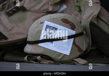 020705-N-3580W-022 Manama, Bahrain (Jul. 2, 2002) -- A prayer card given to Marines of Task Force India from the 4th Marine Expeditionary Brigade Anti-terrorism (4th MEB AT) is attached to a kevlar helmet.  The prayer cards were given to Marines by an Air Force Chaplain before the Marines boarded their bus to their area of operation.  The 4th MEB AT is deployed conducting missions in support of Operation Enduring Freedom.  U.S. Navy photo by Chief Photographer’s Mate Johnny R. Wilson.  (RELEASED) US Navy 020705-N-3580W-022 A prayer card given to Marines of Task Force India from the 4th Marine  Stock Photo