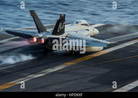 MEDITERRANEAN SEA (March 13, 2013) An F/A-18F assigned to the Jolly Rogers of Strike Fighter Squadron (VFA) 103 launches from the aircraft carrier USS Dwight D. Eisenhower (CVN 69). Dwight D. Eisenhower departed Naval Station Norfolk on a deployment in support of maritime security operations and theater security cooperation efforts in the U.S. 5th and 6th Fleet areas of responsibility. (U.S. Navy photo by Mass Communication Specialist Seaman Andrew Schneider/Released) 130313-N-XQ474-192 Join the conversation http://www.facebook.com/USNavy http://www.twitter.com/USNavy http://navylive.dodlive.m Stock Photo