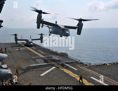 GULF OF THAILAND (Feb. 19, 2013) An MV-22 Osprey assigned to Marine Medium Tiltrotor Squadron (VMM) 265 takes off from the amphibious assault ship USS Bonhomme Richard (LHD 6) as another Osprey prepares for take-off. The Bonhomme Richard Amphibious Ready Group is deployed in the U.S. 7th Fleet area of responsibility and taking part in Cobra Gold, a Thai-U.S. co-sponsored multinational joint exercise designed to advance regional security by exercising a robust multinational force from nations sharing common goals and security commitments in the Asia-Pacific region. (U.S. Navy photo by Mass Comm Stock Photo