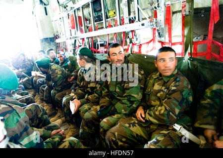 091119-N-6939M-008 KABUL (Nov. 19, 2009) Graduates from Afghan National Army accelerated combat company training program in route to Camp Bastion in the Helmand Province where they will reinforce troops of the ANA 205th battalion.  Accelerated companies are part of the goal of a 134,000 soldier army by October of 2010. The companies play an integral role in the increased capability of the Afghanistan National Army.   091119-N-6939M-008 KABUL, Afghanistan (US Navy photo by Mass Communication Specialist 1st Class Christopher Mobley) (RELEASED) 091119-N-69390-008 (4147048853) Stock Photo