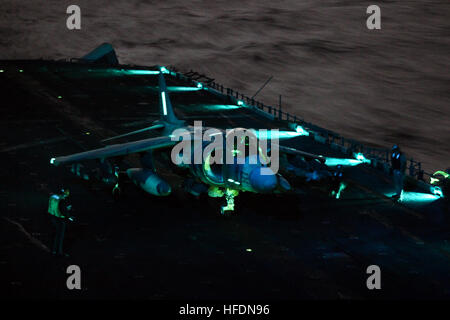 110321-M-1869L-084.jpg (March 20, 2011) ABOARD USS KEARSARGE, at sea ñ A Marine Medium Tiltrotor Squadron, 26th Marine Expeditionary Unitís AV-8B Harrier jump jet returns to USS Kearsarge for fuel and ammunition resupply while conducting air strikes in support of Joint Task Force Odyssey Dawn, March 20, 2011. Joint Task Force Odyssey Dawn is the U.S. Africa Command task force established to provide operational and tactical command and control of U.S. military forces supporting the international response to the unrest in Libya and enforcement of United Nations Security Council Resolution (UNSCR Stock Photo