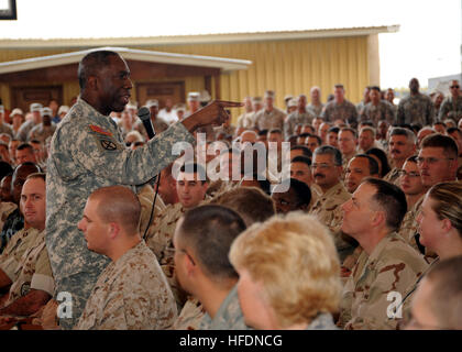 U.S. Army Gen. William E. Ward, Commander, U.S. Africa Command speaks with troops stationed at Camp Lemonnier during an all-hands call, Feb. 10. During his visit Ward met with the new Navy senior leaders, led an all-hands call, and presided over a ribbon-cutting ceremony for the new 'Enduring Ramp' apron. 'Wonderful Opportunity' in the Horn of Africa 250370 Stock Photo