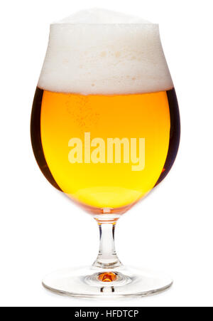 Full snifter glass of pale lager of pilsner beer with a large head of foam isolated on white background Stock Photo