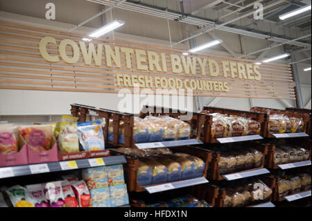 Bilingual welsh and english signage  in the Tesco supermarket superstore, Aberystwyth Wales UK (on the opening day of the store 24 November 2016) Stock Photo