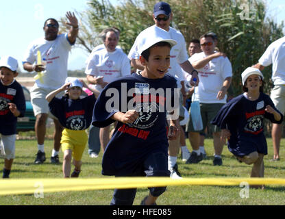 040603-N-0780F-035 Souda Bay, Crete, Greece (Jun. 3, 2004) - A student from the Therapeutic and Rehabilitation Center for Children and Youth School in Chania, Crete nears the finish line in a race during this year's Special Olympics. 137 students and 60 school staff members representing six special needs schools in the Chania area participated in the fourth annual event hosted by U.S. Naval Support Activity (NSA) Souda Bay. Over 200 Sailors, Airmen, and civilian employees hosted the visitors for a day of fun and games. U.S. Navy photo by Paul Farley (RELEASED) US Navy 040603-N-0780F-035 A stud Stock Photo