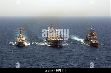 040618-N-5319A-006 Arabian Gulf (June 18, 2004) Ð The guided missile destroyer USS Bulkeley (DDG 84) and the Spruance-class destroyer USS Cushing (DD 985) conduct an underway replenishment with the Military Sealift Command (MSC) oiler USNS Tippecanoe (T-AO 199). The three ships are on a regularly scheduled deployment in support of Operation Iraqi Freedom (OIF). U.S. Navy photo by PhotographerÕs Mate 1st Class Brien Aho (RELEASED) US Navy 040618-N-5319A-006 The guided missile destroyer USS Bulkeley (DDG 84) and the Spruance-class destroyer USS Cushing (DD 985) conduct an underway replenishment Stock Photo