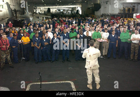 040820-N-0962S-007 Arabian Gulf (Aug. 20, 2004) - Master Chief Petty Officer of the Navy (MCPON) Terry Scott speaks to Sailors aboard the aircraft carrier USS John F. Kennedy (CV 67), deployed in support of Operation Iraqi Freedom (OIF). Scott was joined by Sgt. Maj. of the Marine Corps, John Estrada, during their first joint visit to the 5TH Fleet area of responsibility (AOR). The Navy/Marine Corps top enlisted leaders emphasized the importance of their serviceÕs joint partnership during their visit throughout region.  U.S. Navy photo by Journalist 2nd Class Brandan W. Schulze (RELEASED) US N Stock Photo