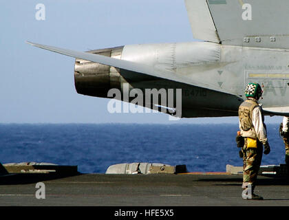 041115-N-0057P-002 Pacific Ocean (Nov. 15, 2004) - A final checker checks the tail wing of a F/A-18C Hornet from Strike Fighter Squadron One Five One (VFA-151) 'Fighting Vigilantes' prior to take off during flight operations aboard USS Abraham Lincoln (CVN 72). Lincoln and embarked Carrier Air Wing TWO (CVW-2) are currently deployed to the Western Pacific Ocean. Carrier Strike Group Nin (CSG-9) is the first to be used in the surge role in support of the Chief of Naval Operations Fleet Response Plan. U.S. Navy photo by Photographer's Mate 2nd Class Seth C. Peterson (RELEASED) US Navy 041115-N-0 Stock Photo