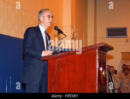 041121-N-1825E-002 Manama, Bahrain (Nov. 21, 2004) - Secretary of the Navy (SECNAV), the Honorable Gordon R. England, addresses more than 300 officers and enlisted Sailors and Marines in Manama, Bahrain. Secretary England opened the floor for questions and discussed education, computer training and balancing professional and personal goals. He is scheduled to visit seven other countries during his 10-day trip to the Middle East, including Egypt, Djibouti and Kuwait. U.S. Navy photo by Journalist Seaman Joseph Ebalo (RELEASED) US Navy 041121-N-1825E-002 Secretary of the Navy (SECNAV), the Honor Stock Photo