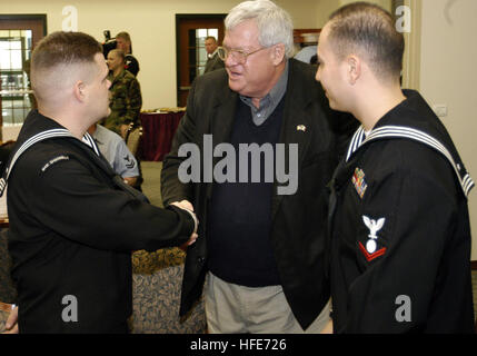 041219-N-5821W-005 Naval Air Station Sigonella, Sicily (Dec. 19, 2004) - Speaker of the House, J. Dennis Hastert (R-Ill.), greets a Sailor assigned to Naval Air Station Sigonella after the completion of a round table discussion. Sigonella was the last stop for a group of eight congressmen who toured bases in Turkey, Greece, Germany, Luxembourg and Italy. The delegation also attended the 60th anniversary of the Battle of the Bulge ceremony in Bastogne, Belgium. U.S. Navy photo by Journalist 2nd Class Stephen P. Weaver (RELEASED) US Navy 041219-N-5821W-005 Speaker of the House, J. Dennis Hastert Stock Photo