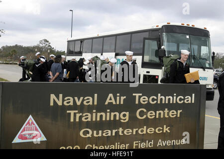 050126-N-4204E-017 Pensacola, Fla. (Jan. 26, 2005) - Sailors arrive at Chevalier Hall building on board Naval Air Station Pensacola, Fla., directly from Basic Training at Great Lakes, Ill. Chevalier Hall is the home of the Center for Naval Aviation Technical Training (CNATT) and the Naval Air Technical Training Center (NATTC). The building was devastated with heavy damage from Hurricane Ivan in September 2004. An official ribbon cutting ceremony is scheduled for Jan. 27, 2005, as the building is returned to the Navy for training. U.S. photo by Photographer's Mate 2nd Class Mark A. Ebert (RELEA Stock Photo