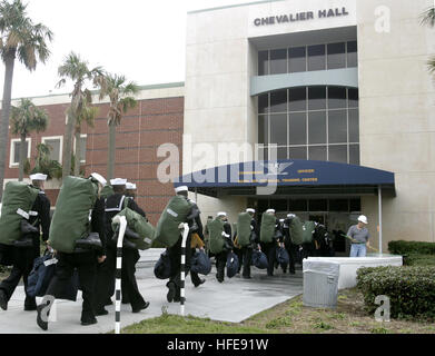 050126-N-4204E-021 Pensacola, Fla. (Jan. 26, 2005) - Sailors arrive at Chevalier Hall building on board Naval Air Station Pensacola, Fla., directly from Basic Training at Great Lakes, Ill. Chevalier Hall is the home of the Center for Naval Aviation Technical Training (CNATT) and the Naval Air Technical Training Center (NATTC). The building was devastated with heavy damage from Hurricane Ivan in September 2004. An official ribbon cutting ceremony is scheduled for Jan. 27, 2005, as the building is returned to the Navy for training. U.S. photo by Photographer's Mate 2nd Class Mark A. Ebert (RELEA Stock Photo