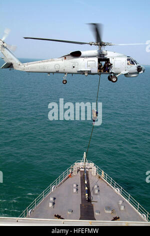 The Australian guided missile frigate HMAS ADELAIDE (FFG-01) and the ...