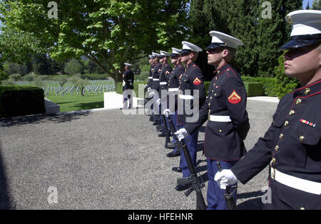 030525-N-7438S-007 Draguignan, France (May 25, 2003) -- The U.S. Marine firing detail stands at parade rest during a Memorial Day ceremony at Rhone National Cemetery in Draguignan, France.  Forty-two Marines, Sailors and Airmen from Naval Station Rota, Spain participated in the event to honor the 800 U.S. service men buried there.  U.S. Navy photo by Chief Journalist Dan Smithyman.  (RELEASED) US Navy 030525-N-7438S-007 The U.S. Marine firing detail stands at parade rest during a Memorial Day ceremony Stock Photo