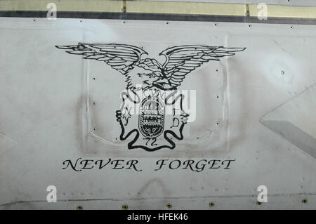 030430-N-9228K-009 The Pacific Ocean (Apr. 30, 2003) -- An F/A-18E Super Hornet assigned to the ÒEaglesÓ of Strike Fighter Squadron One Fifteen (VFA-115) is painted with the names and crest of the fallen New York City Firefighters who gave their lives rescuing victims of the World Trade Center attacks of Sept. 11, 2001.  USS Abraham Lincoln (CVN 72) and Carrier Air Wing Fourteen (CVW-14) are returning from their record-breaking deployment of 9 months to the Arabian Gulf in support of Operation Iraqi Freedom.  U.S. Navy photo by Photographer's Mate 3rd Class Michael S. Kelly.  (RELEASED) US Nav Stock Photo