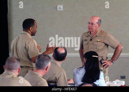 030502-N-2383B-045 Arlington, Va. (May 2, 2003) -- Adm. Vern Clark, Chief of Naval Operations (CNO) listens to a question by Force Master Chief Keith Goosby from Naval Air Forces Pacific during the Spring 2003 CNO/MCPON Leadership Forum.  The forum consists of the Navy's 42 Fleet, Force and CNO-Directed Command Master Chiefs, who collectively represent every enlisted Sailor in the Navy and serve as advisors to the CNO and Master Chief Petty Officer of the Navy (MCPON) Terry D. Scott.  U.S. Navy photo by Chief Photographer's Mate Johnny Bivera.  (RELEASED) US Navy 030502-N-2383B-045 Adm. Vern C Stock Photo