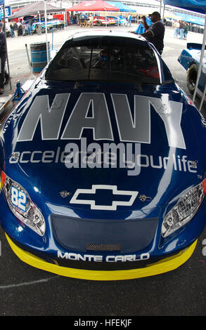 030523-N-5862D-158  Charlotte, N.C. (May 23, 2003) -- The Fitz-Bradshaw racing team pit crew prepare the U.S. Navy sponsored, Busch series race car for qualifying trials at Lowe's Motor Speedway.  Atwood will drive the blue and silver Chevrolet in eight races, beginning with the Carquest Auto Parts 300 on Saturday, May 24, 2003.  Additionally, he will represent the Navy in a Winston Cup Series race later in the year.  U.S. Navy Photo by Chief Photographer's Mate Chris Desmond. (RELEASED) US Navy 030523-N-5862D-158 The Fitz-Bradshaw racing team pit crew prepare the U.S. Navy sponsored, Busch se Stock Photo