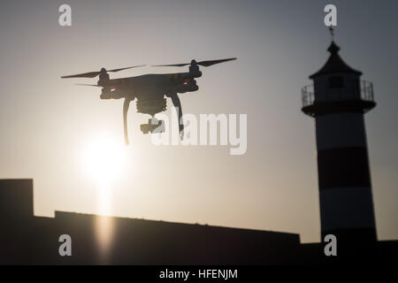 A DJI Phantom 3 Standard drone in flight near Southsea Castle Stock Photo