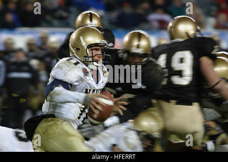 U.S. Navy Midshipman Brye French, a linebacker with the U.S. Naval Academy  football team, watches the U…