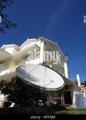 Large satellite dish at large beautiful property near Karousades, Corfu, Greece Stock Photo