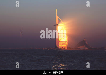 Dubai, United Arab Emirates. 30th Dec, 2016. The hotel Burj Al-Arab, literally Arabian tower, is seen during sunset in Dubai, the United Arab Emirates, Dec. 30, 2016. © Li Zhen/Xinhua/Alamy Live News Stock Photo