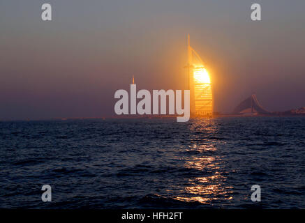 Dubai, United Arab Emirates. 30th Dec, 2016. The hotel Burj Al-Arab, literally Arabian tower, is seen during sunset in Dubai, the United Arab Emirates, Dec. 30, 2016. © Li Zhen/Xinhua/Alamy Live News Stock Photo